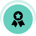 Award badge icon: teal circular badge with a black ribbon and star in the center, representing achievement or quality.",